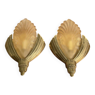 Pair of Art Deco wall sconces in brass and moulded glass.