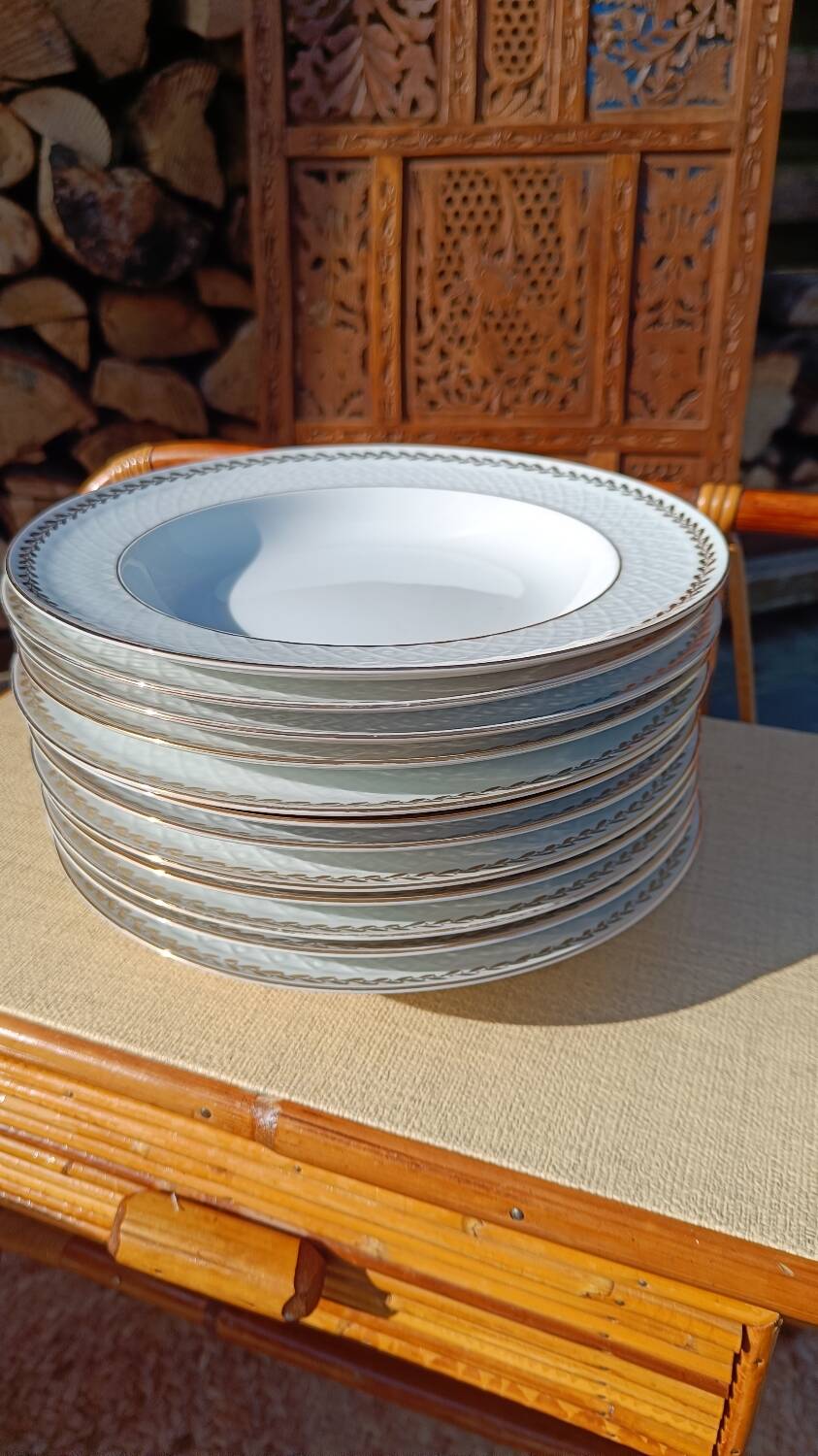 Twelve white porcelain plates