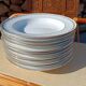 Twelve white porcelain plates