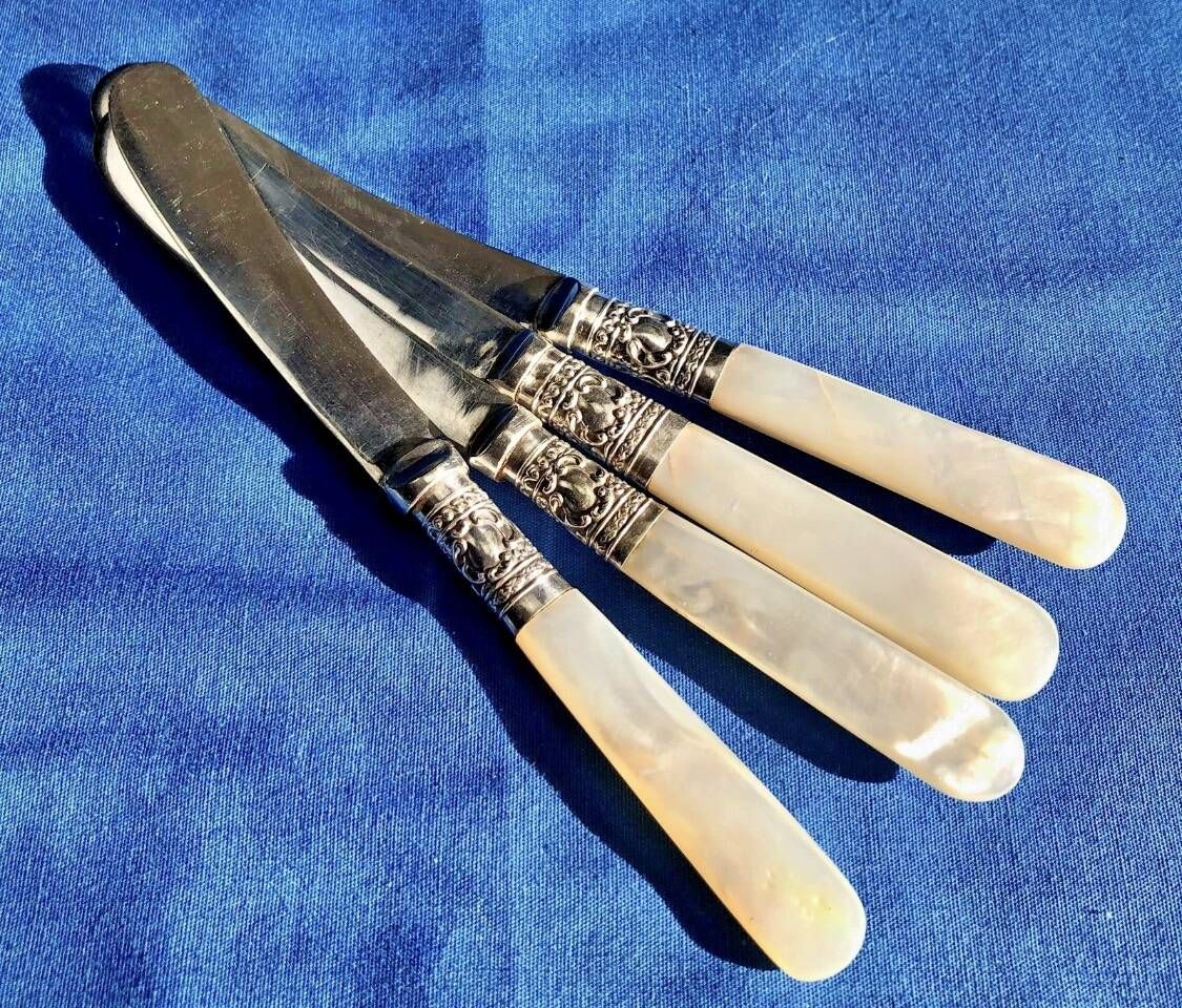 4 antique butter spreading knives in silver-plated metal and mother-of-pearl.