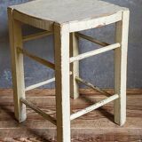 Old patinated painted wooden stool
