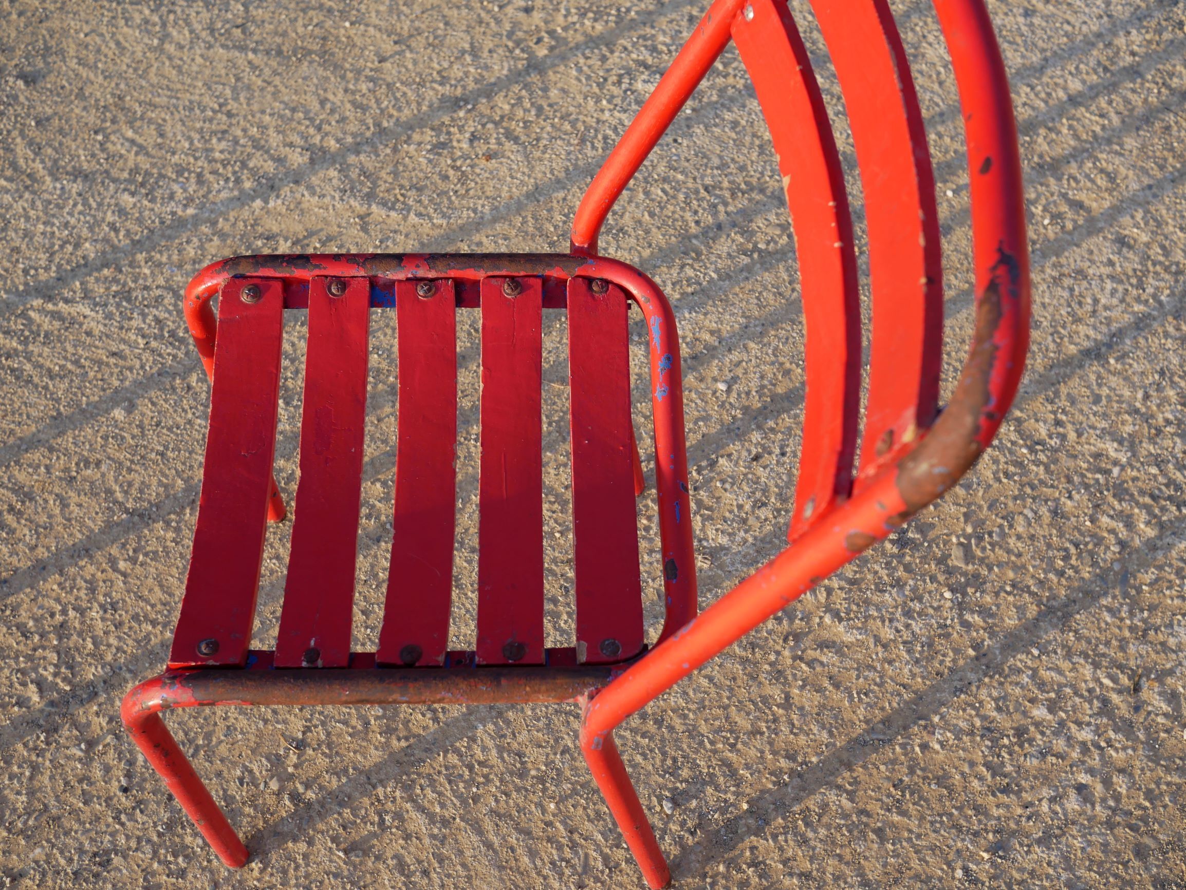 2 chairs Tolix T2 red by Xavier Pauchard