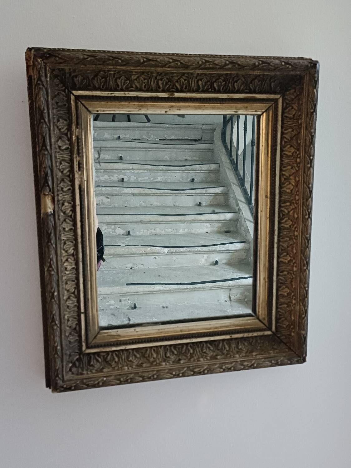 Antique mirror in wood and gilded stucco