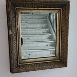 Antique wooden and gilded stucco mirror