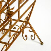Extraordinary mid-century newspaper and magazine rack with a gilded metal