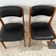 Chaise vintage scandinave en bois et simili cuir noir