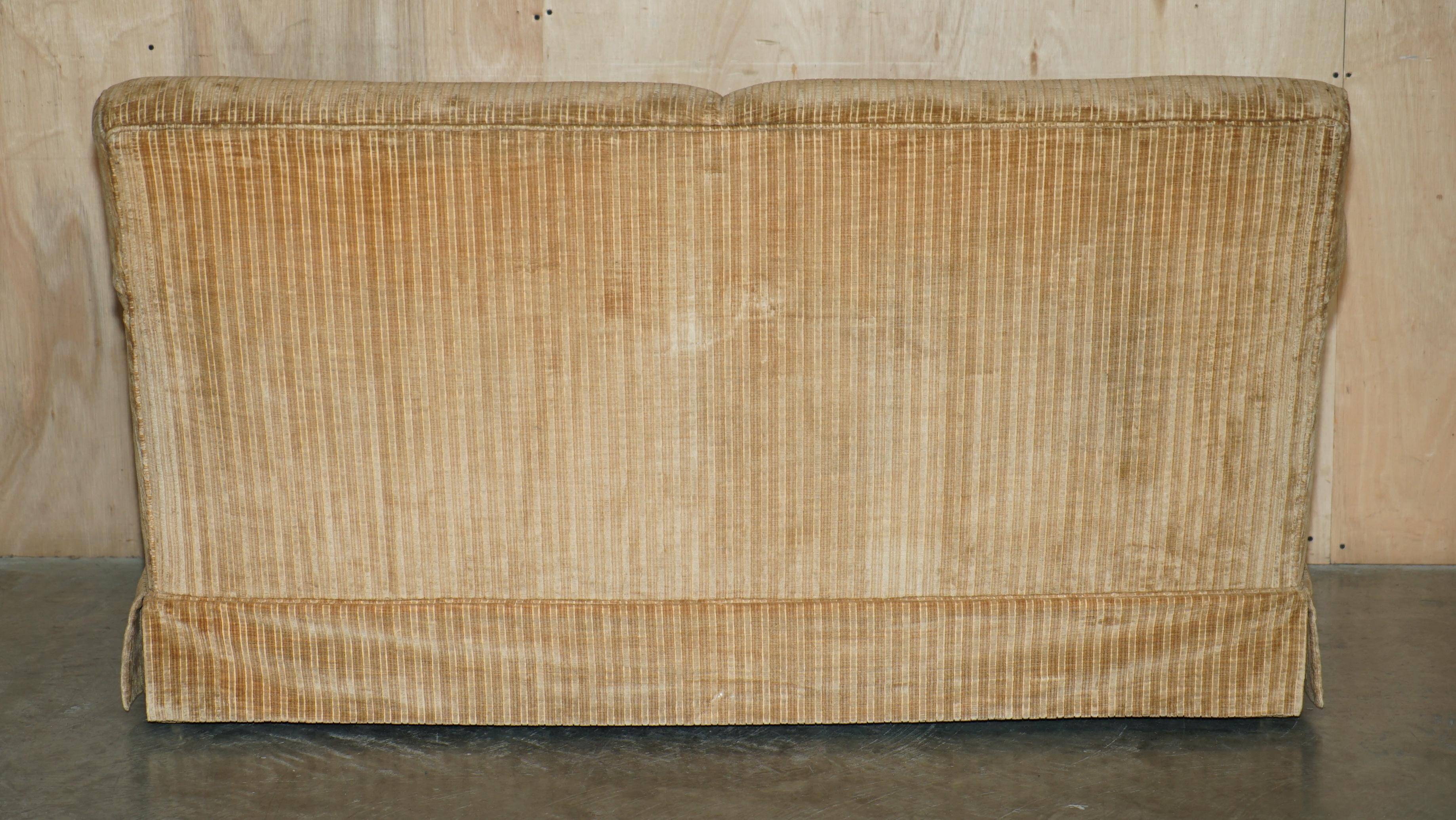 Howard & Sons / Chairs Ltd two-seater canapé with feather-filled cushions.