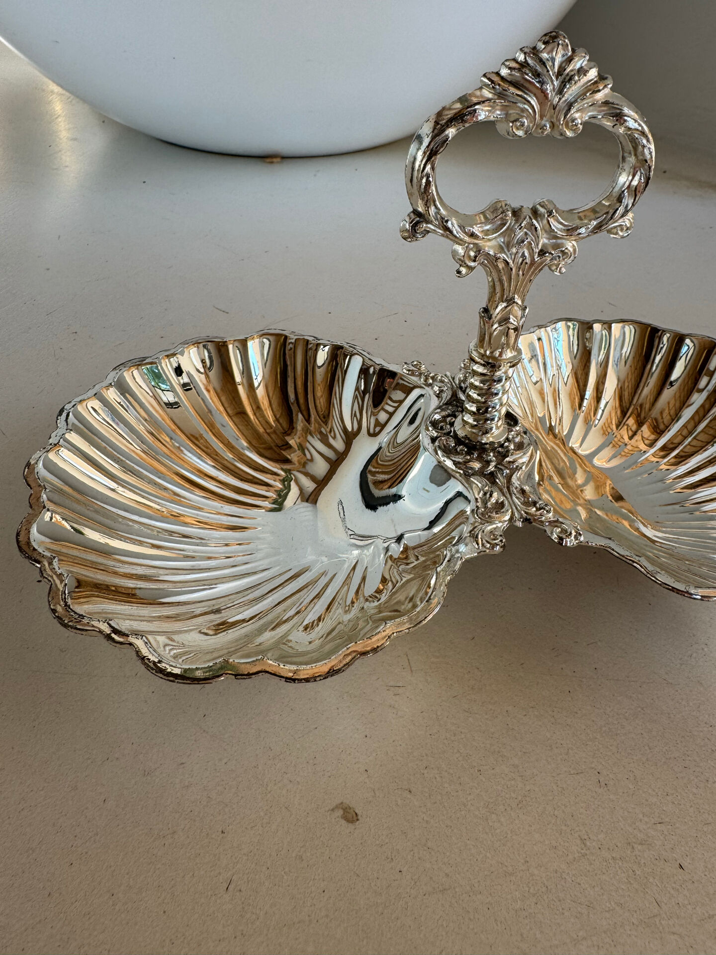Vintage silver-plated shell display stand