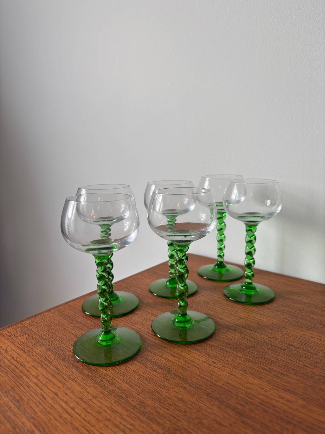 Set of green twisted stem white wine glasses – blown glass