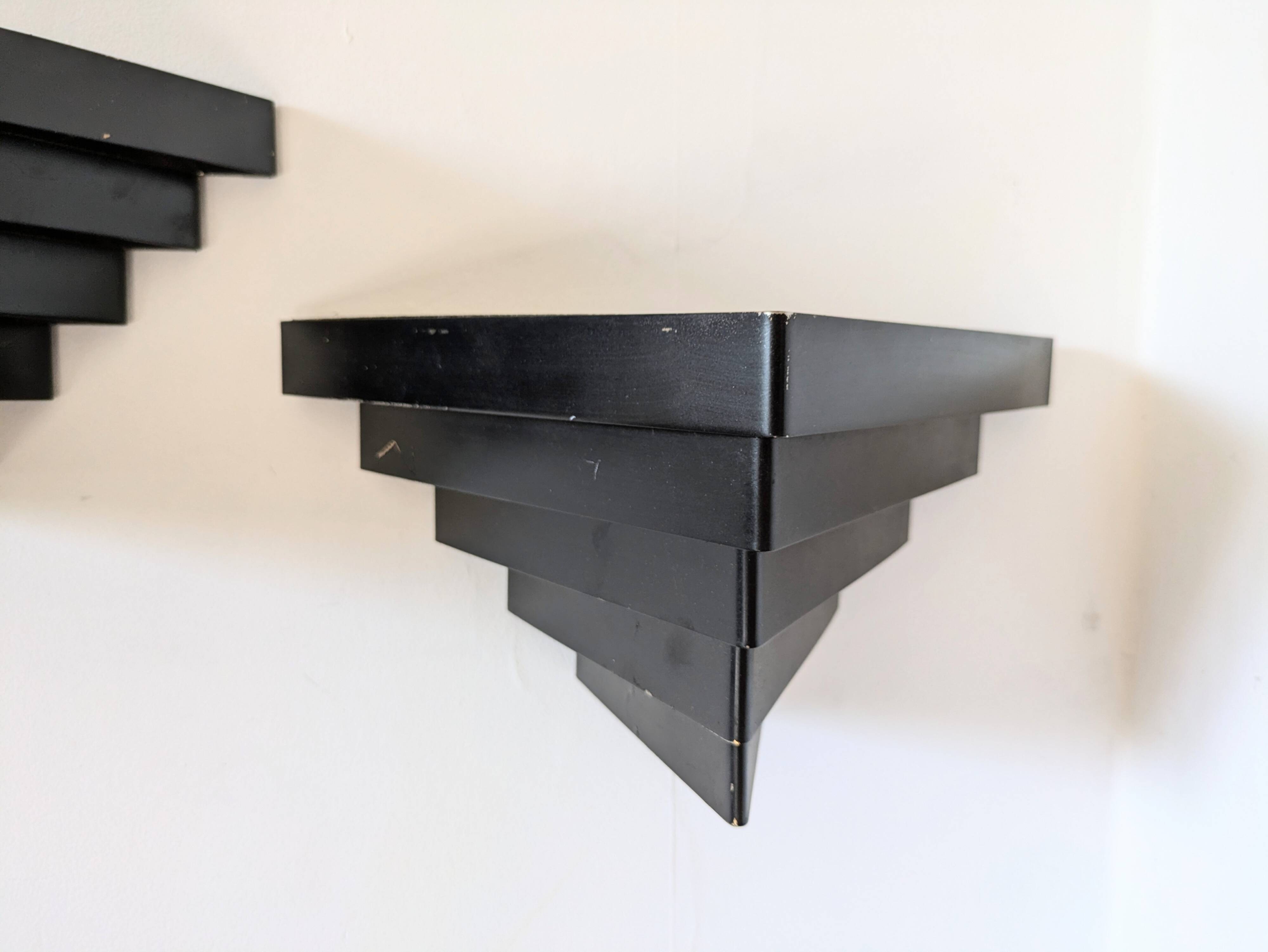 Pair of 1960s wall lights in perforated metal in the style of Mategot