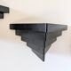 Pair of 1960s wall lights in perforated metal in the style of Mategot