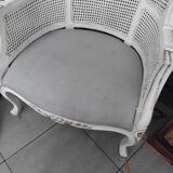 Fauteuil portier vintage en rotin
