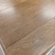 Restored oak table in natural wood and linen.