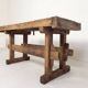 Wooden industrial workbench with vice, 194 cm long, 1930s.