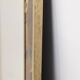 Mirror in marquetry of oxidised and patinated brass. Artist's work.