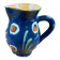 Small blue ceramic jug with hand-painted floral decoration, vintage.