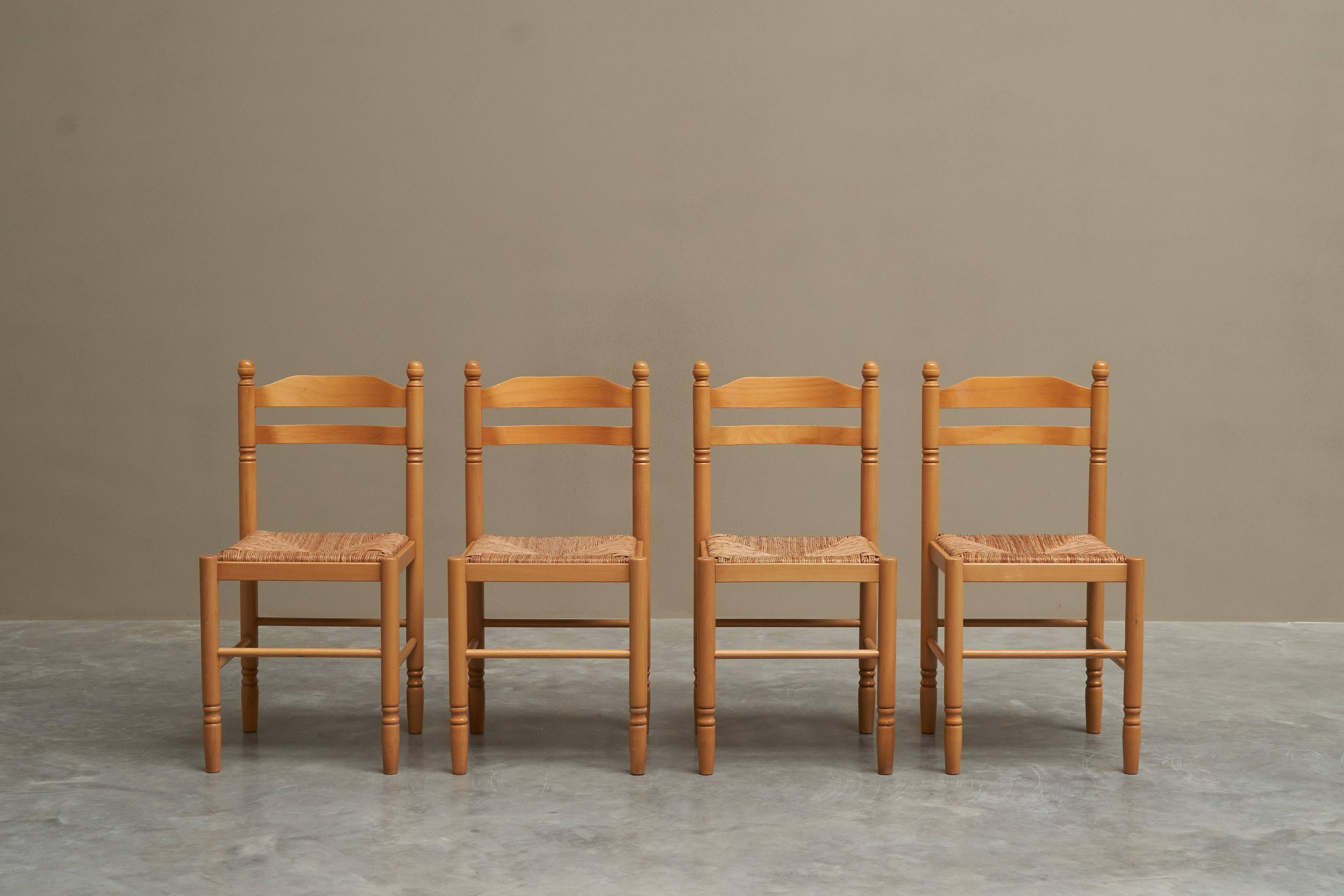 Set of 4 Mid Century beech dining chairs from the 1970s.
