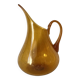 Blown glass jug with caramel bubbles