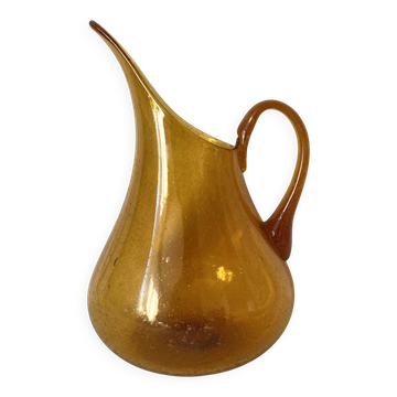 Blown glass jug with caramel bubbles