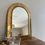 Brass half-moon mirror