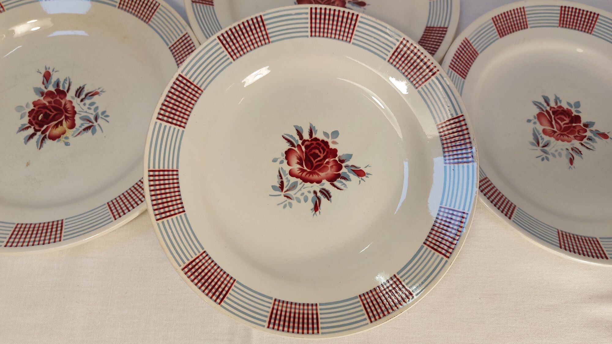 Set of 4 old flat plates from the earthenware factories of St Amand