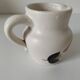 Vintage Marais pottery pitcher with orange floral decoration