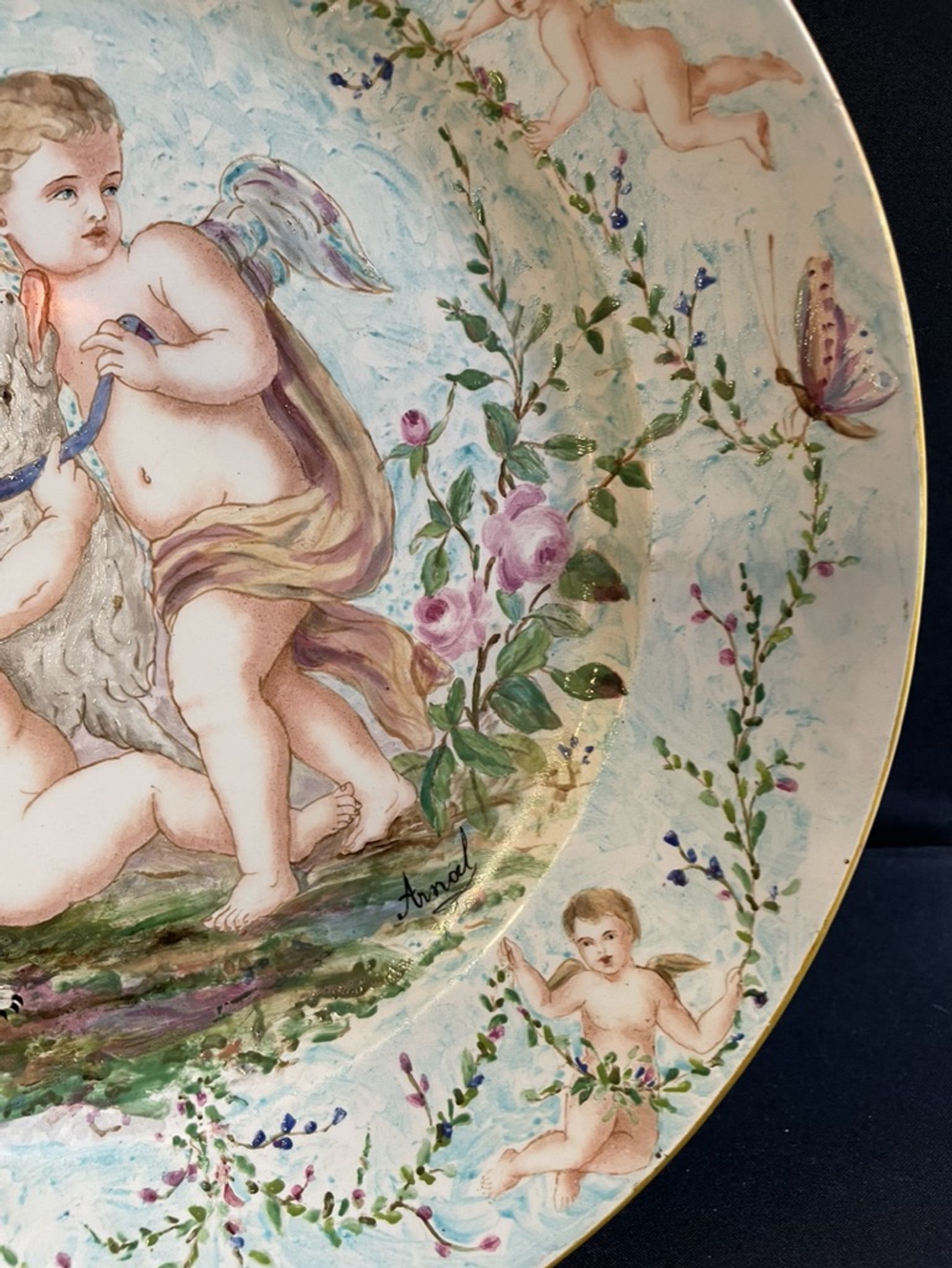 Round earthenware dish - hand decoration signed and marked