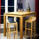 Table haute en bois massif extensible + 4 tabourets