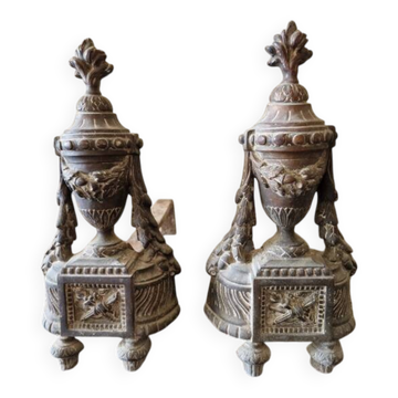 Pair of bronze andirons in Louis XVI style, late 19th century.