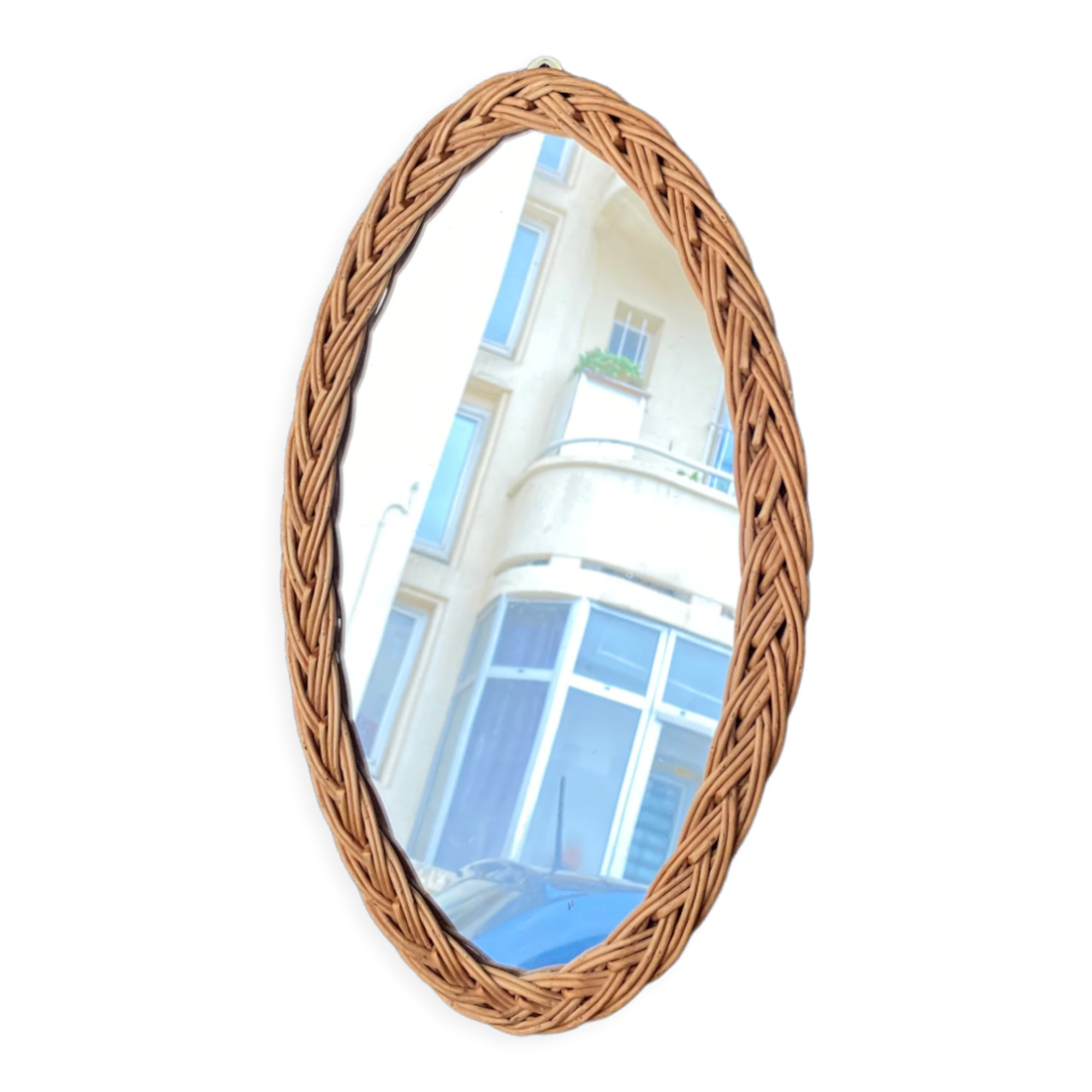 Oval mirror in vintage wicker