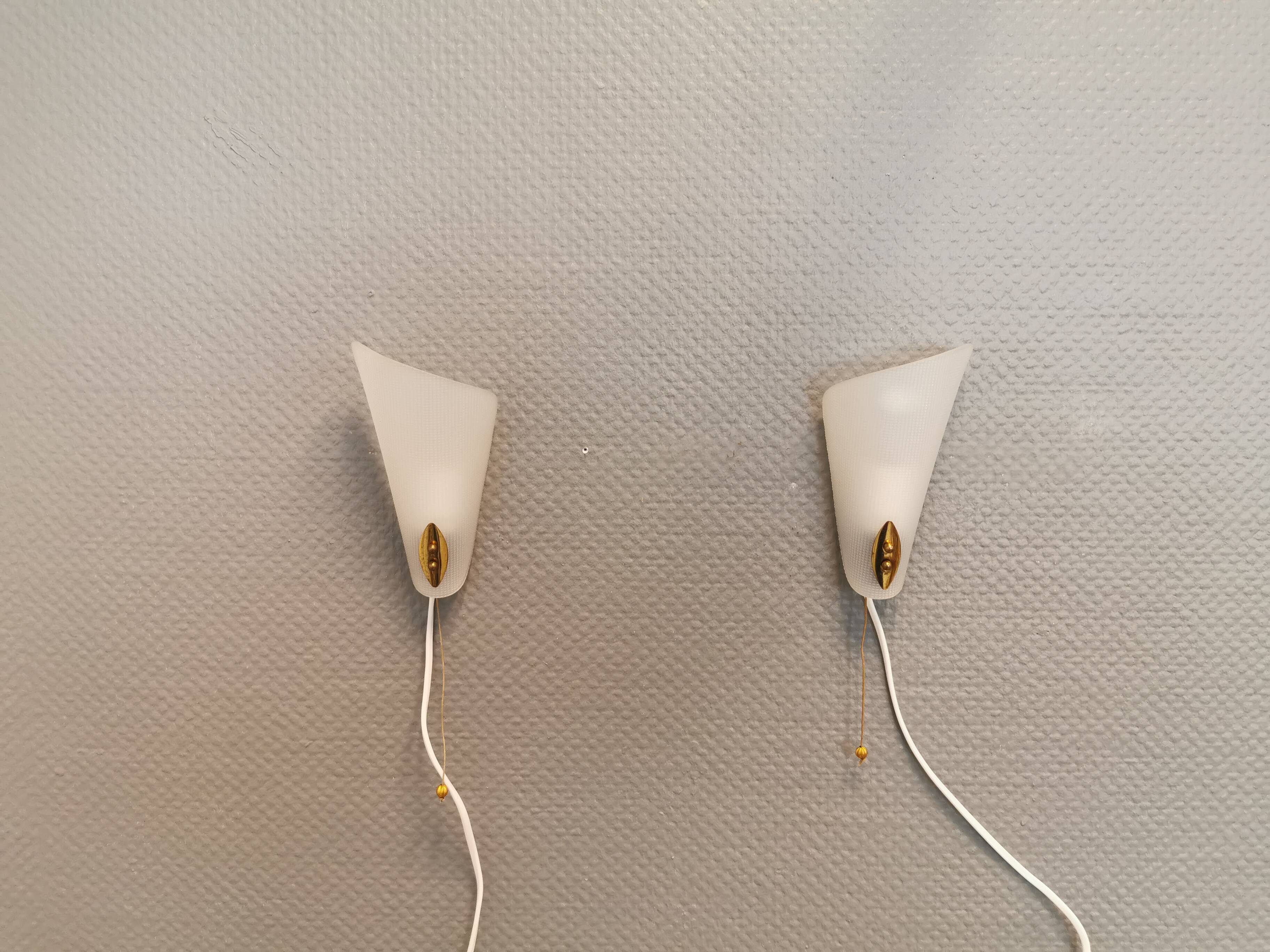 Two small Art Deco wall lights.