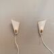 Two small Art Deco wall lights.