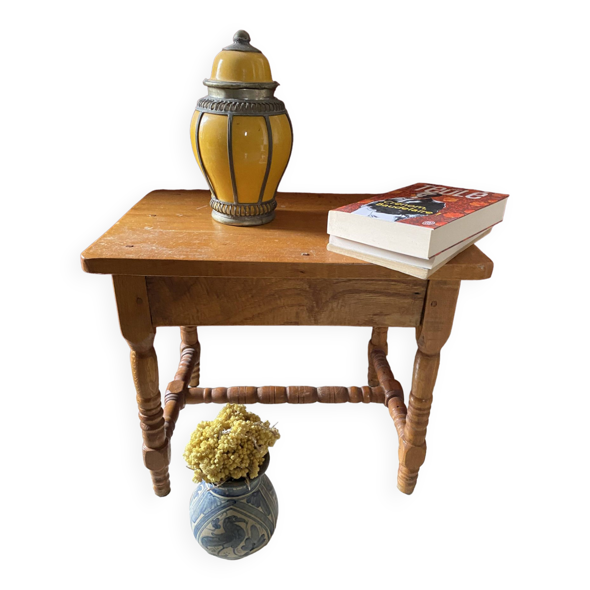 Small footrest bench in bohemian style.