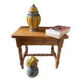 Small footrest bench in bohemian style.