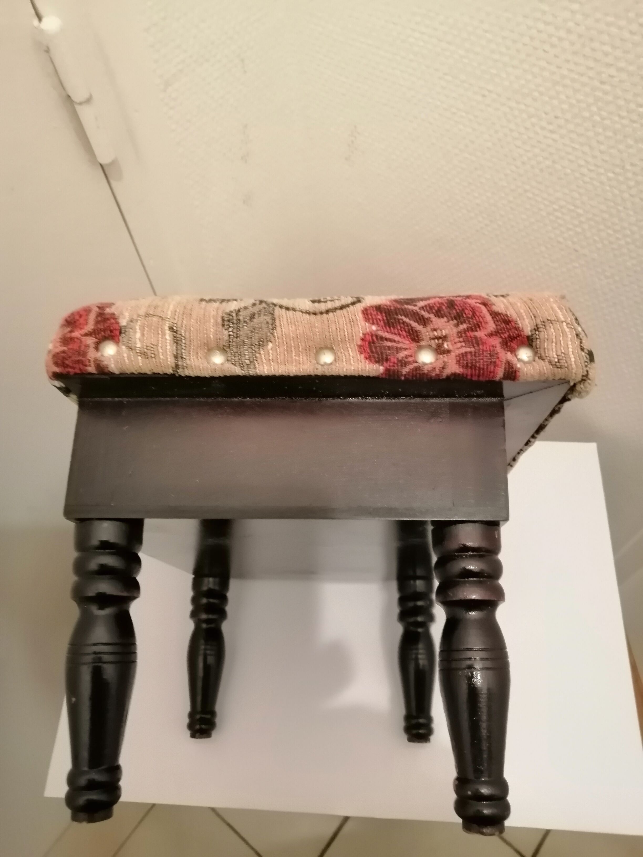 Antique footrest stool in wood and fabric