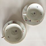 Duo of white Limoges porcelain cups with flowers