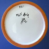 White-blue earthenware vase with stylized plant decoration