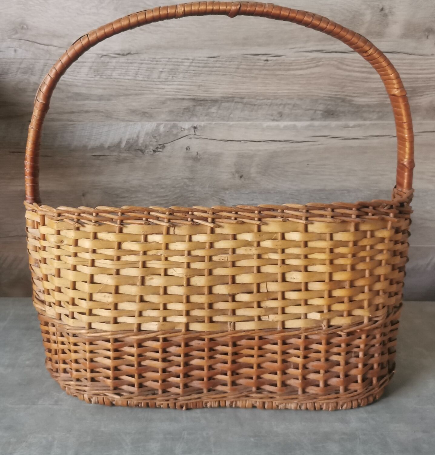Vintage wicker bottle rack