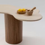 Teā dining table with walnut legs