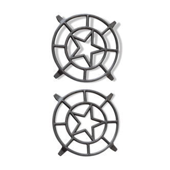 Pair of vintage aluminium metal trivets with star motif
