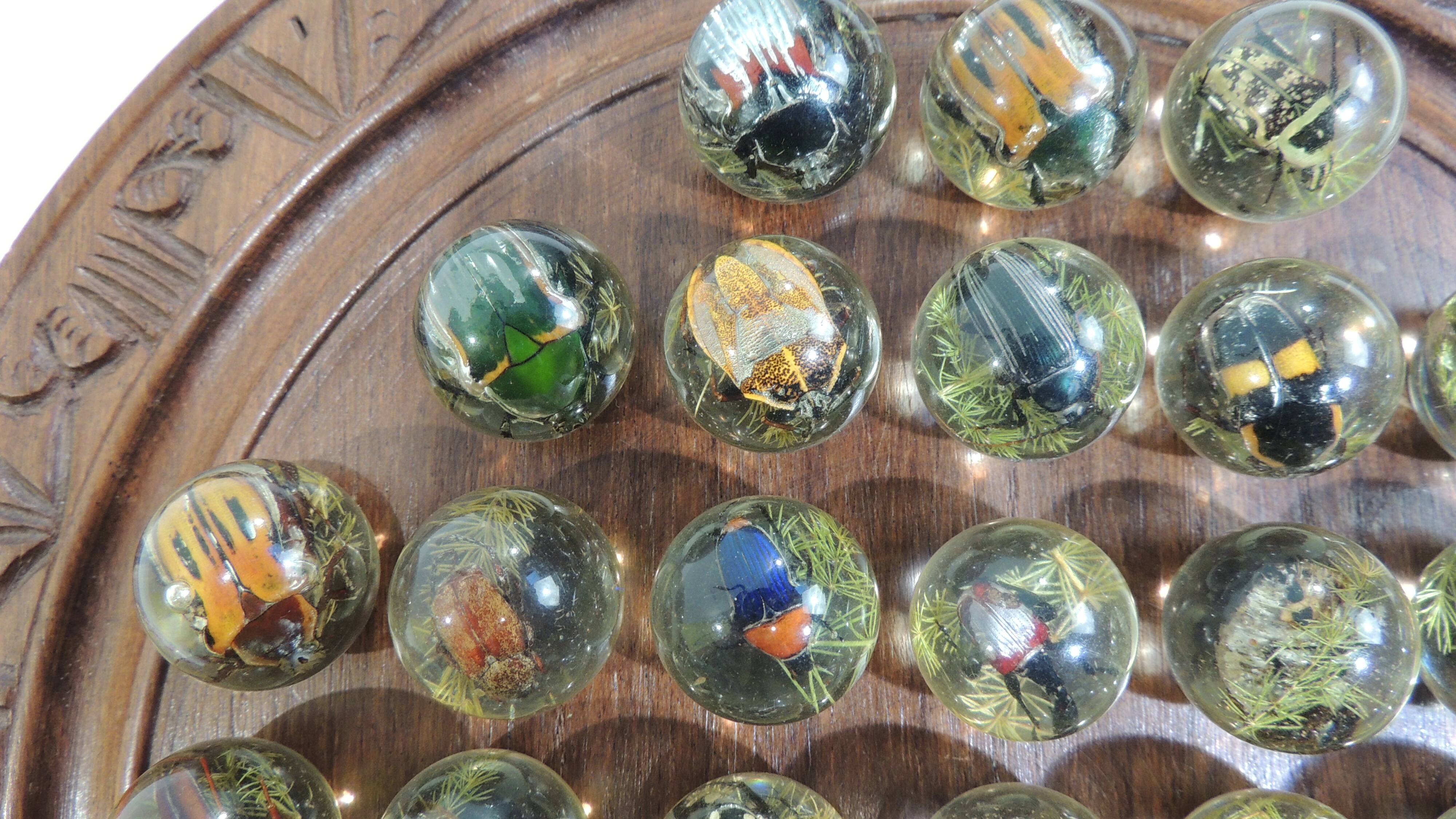 Vintage wooden carved solitaire game – Resin balls with insects –