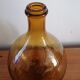 Demijohn canister in blown amber glass