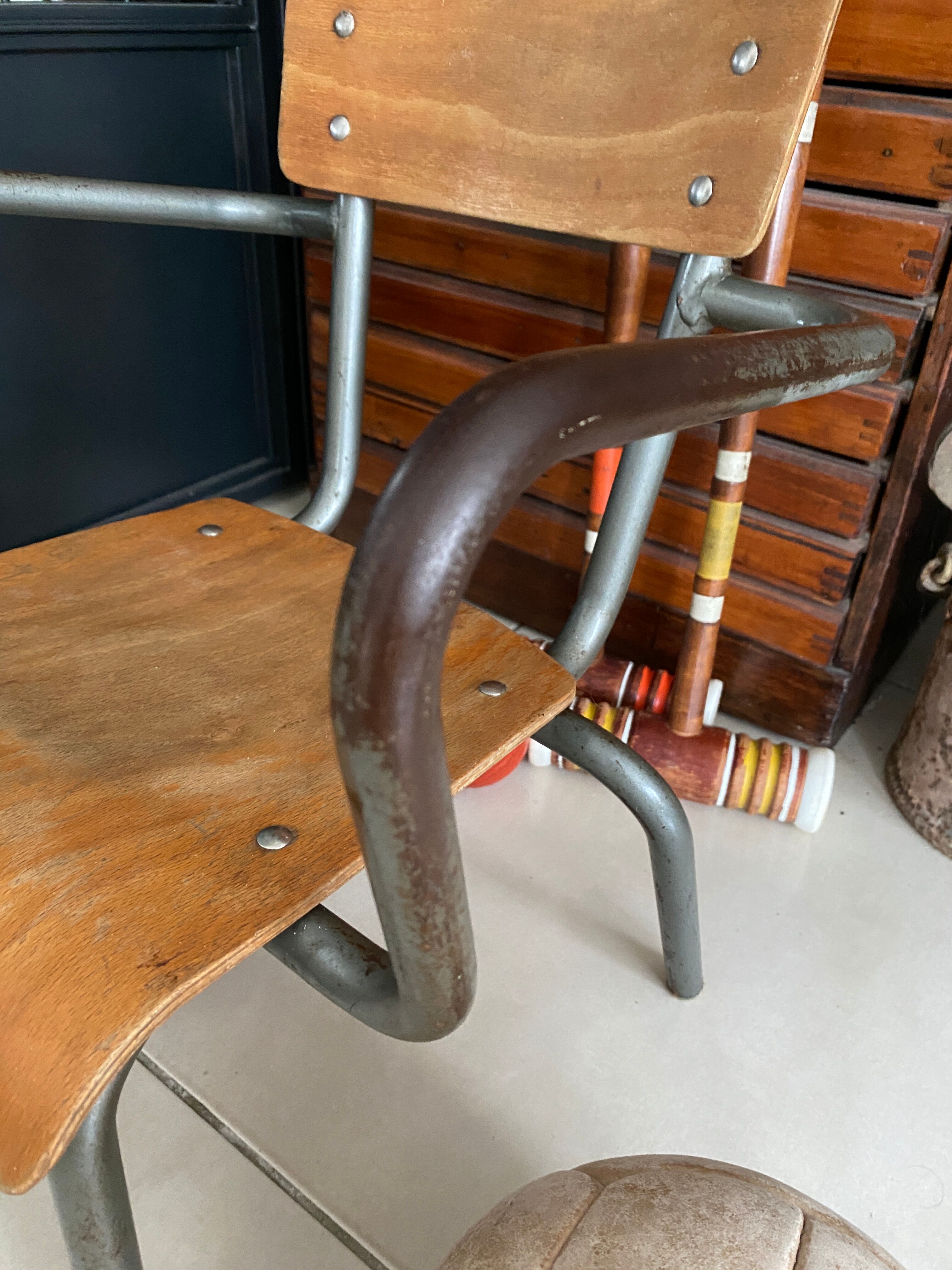 Old Mullca school chair with armrests