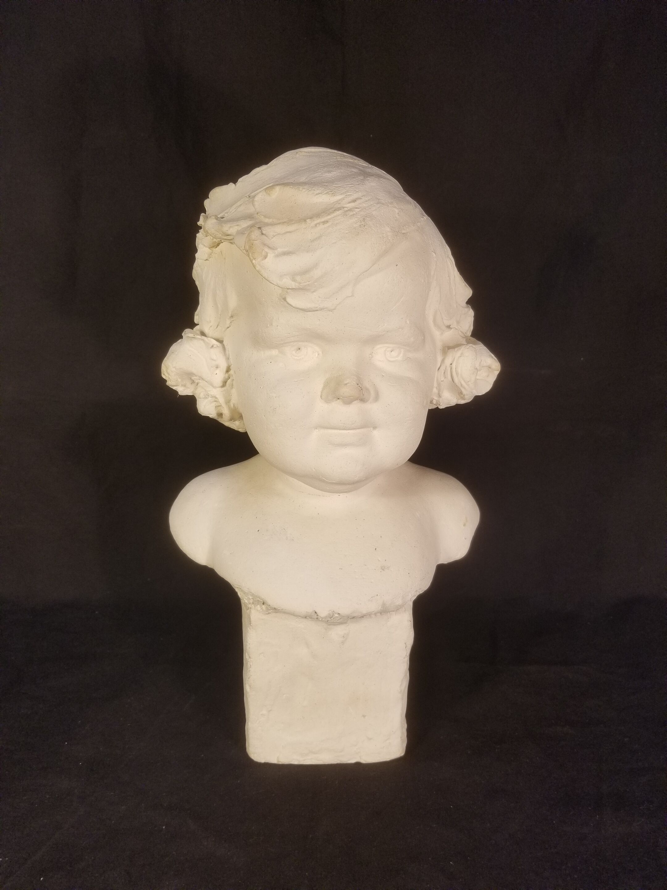 Old plaster bust - The gracious child