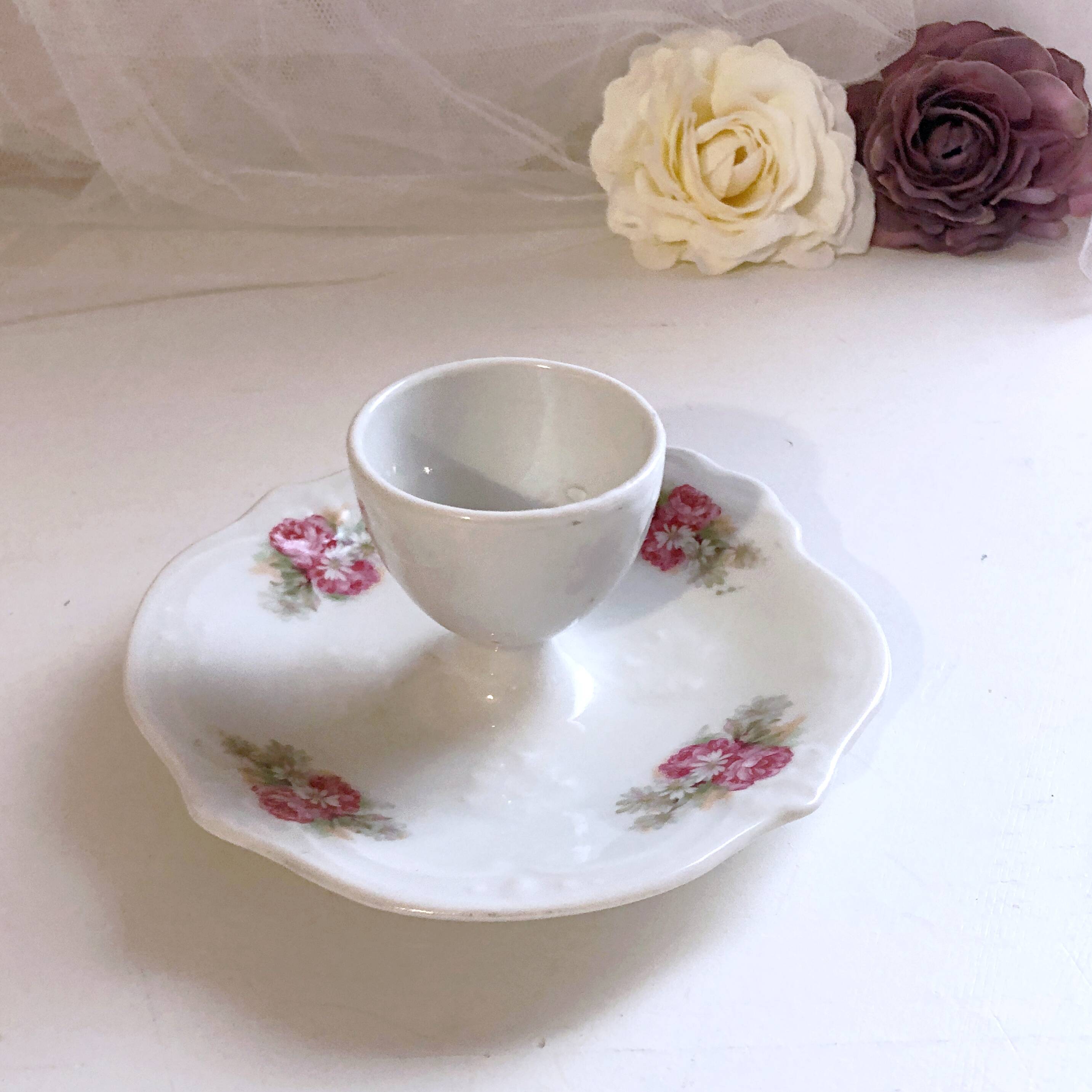 Porcelain egg cup with shabby chic style floral bouquet decoration Romanticism