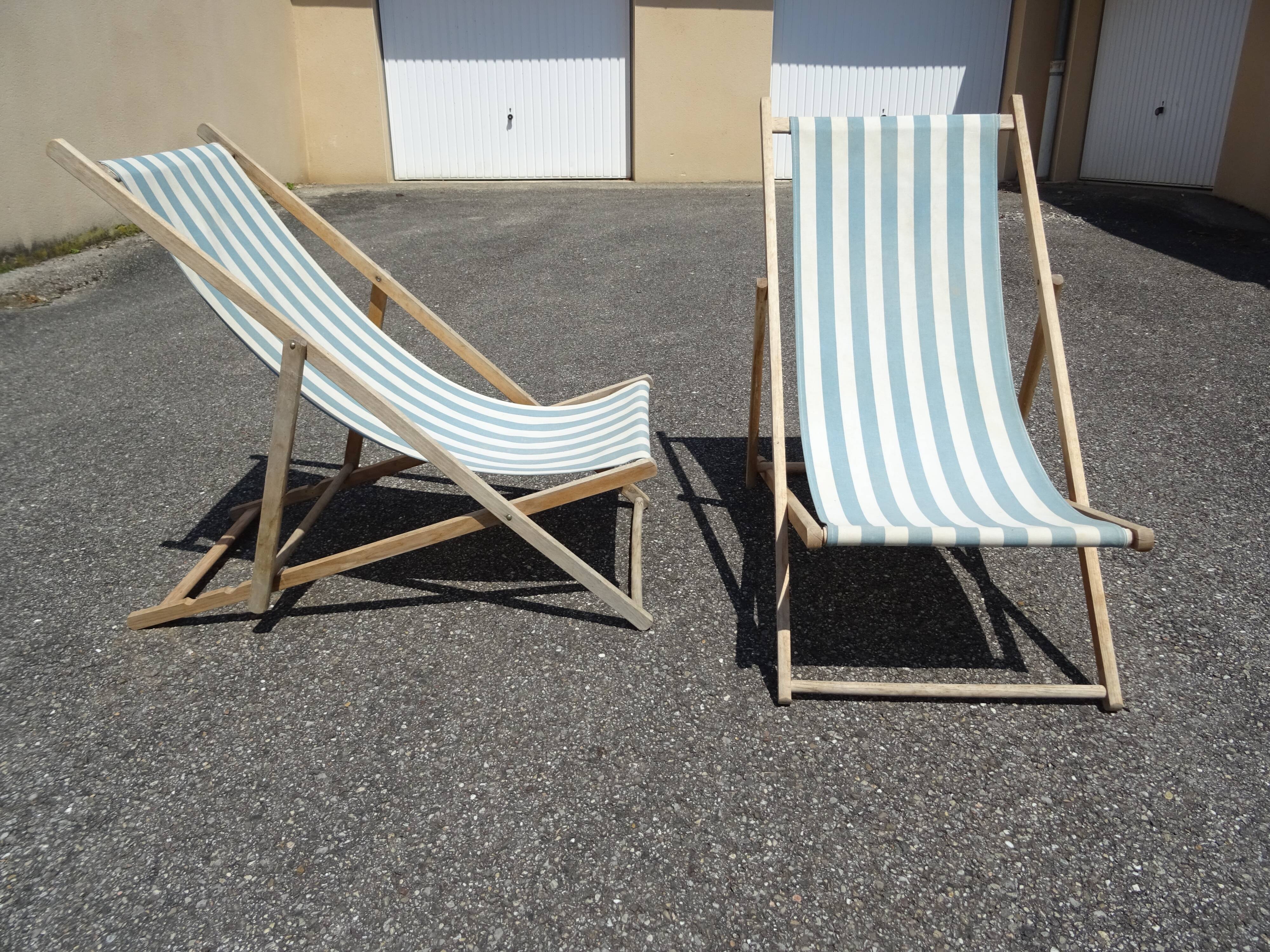 Pair of sun loungers with vintage blue blue stripes