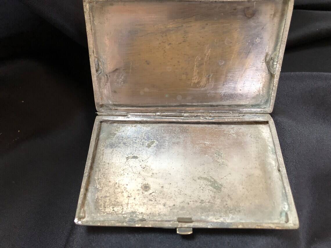Chiseled bronze cigarette case from the late 19th century