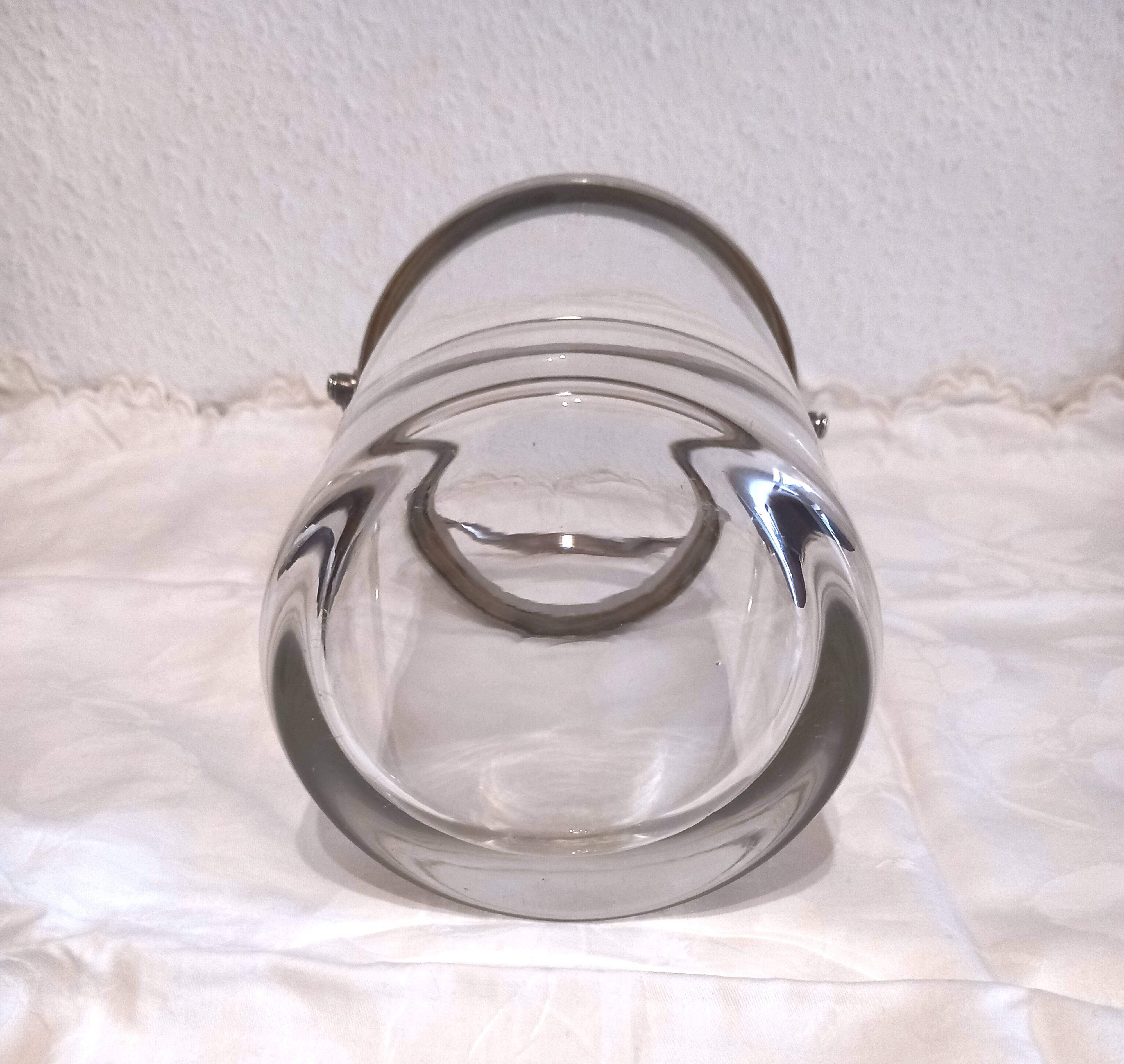Glass and silver metal ice bucket