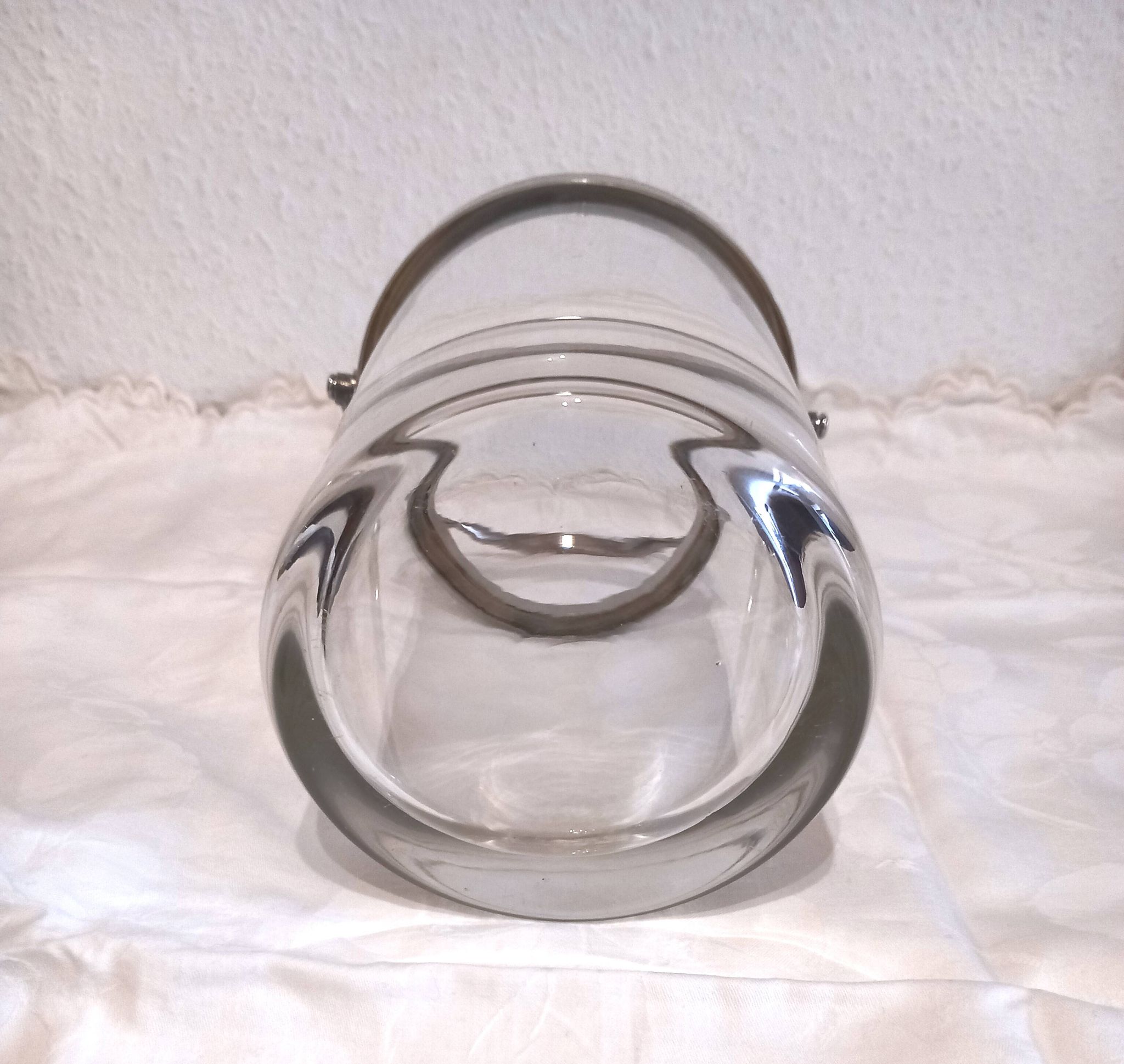 Glass and silver metal ice bucket