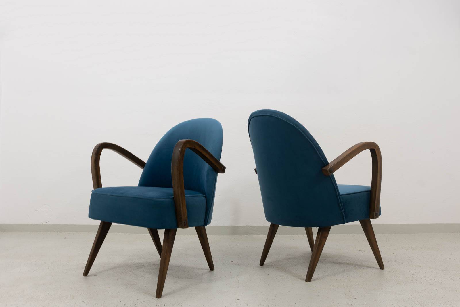 Pair of mid-century cocktail chairs, Poland, 1950s